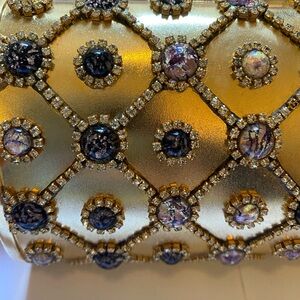 Gold metal bejeweled clutch